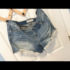 Torrid Jean shorts with lace accents